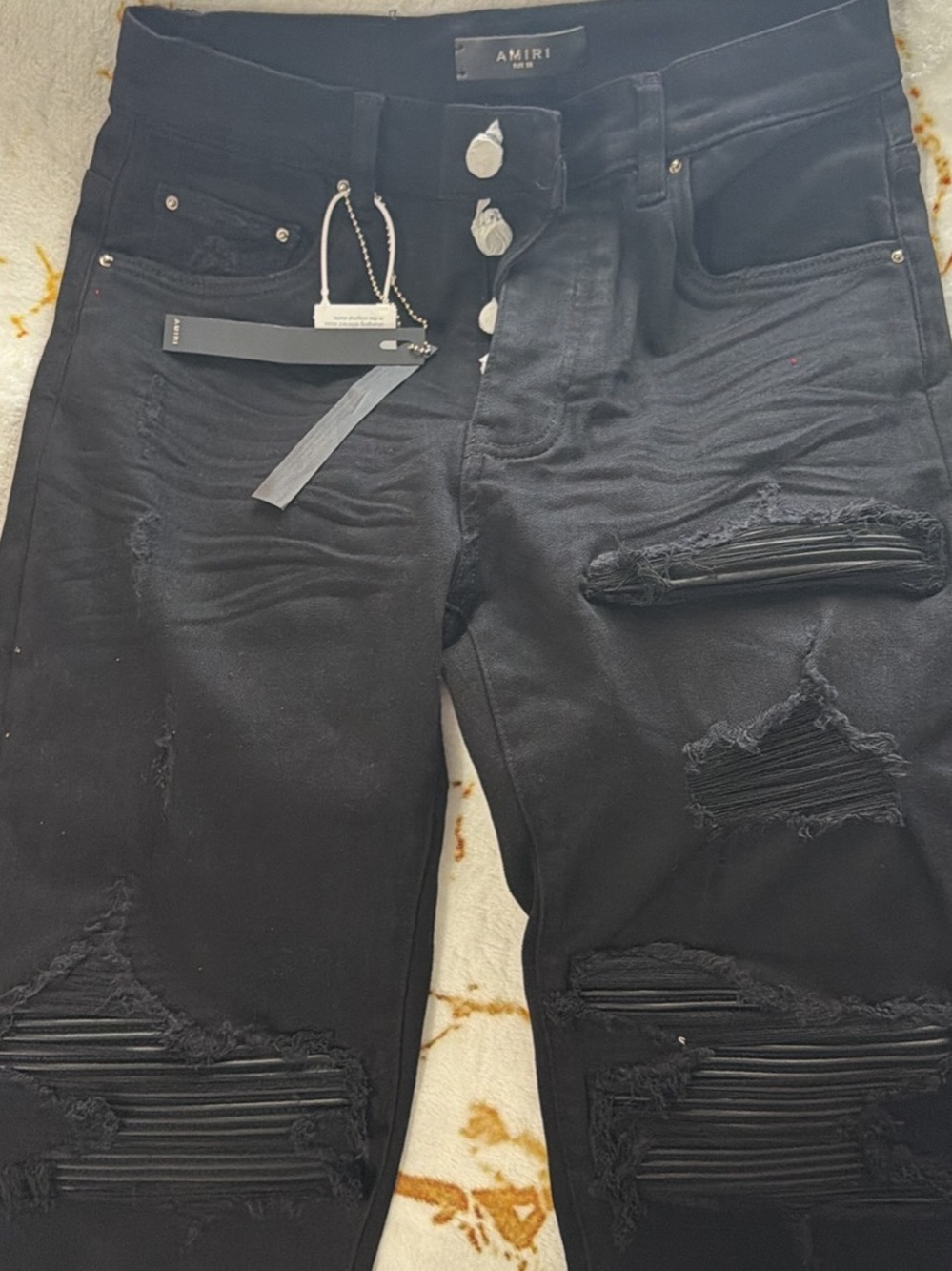 AMIRI Black Distressed Ripped Jeans with Exposed Button Fly